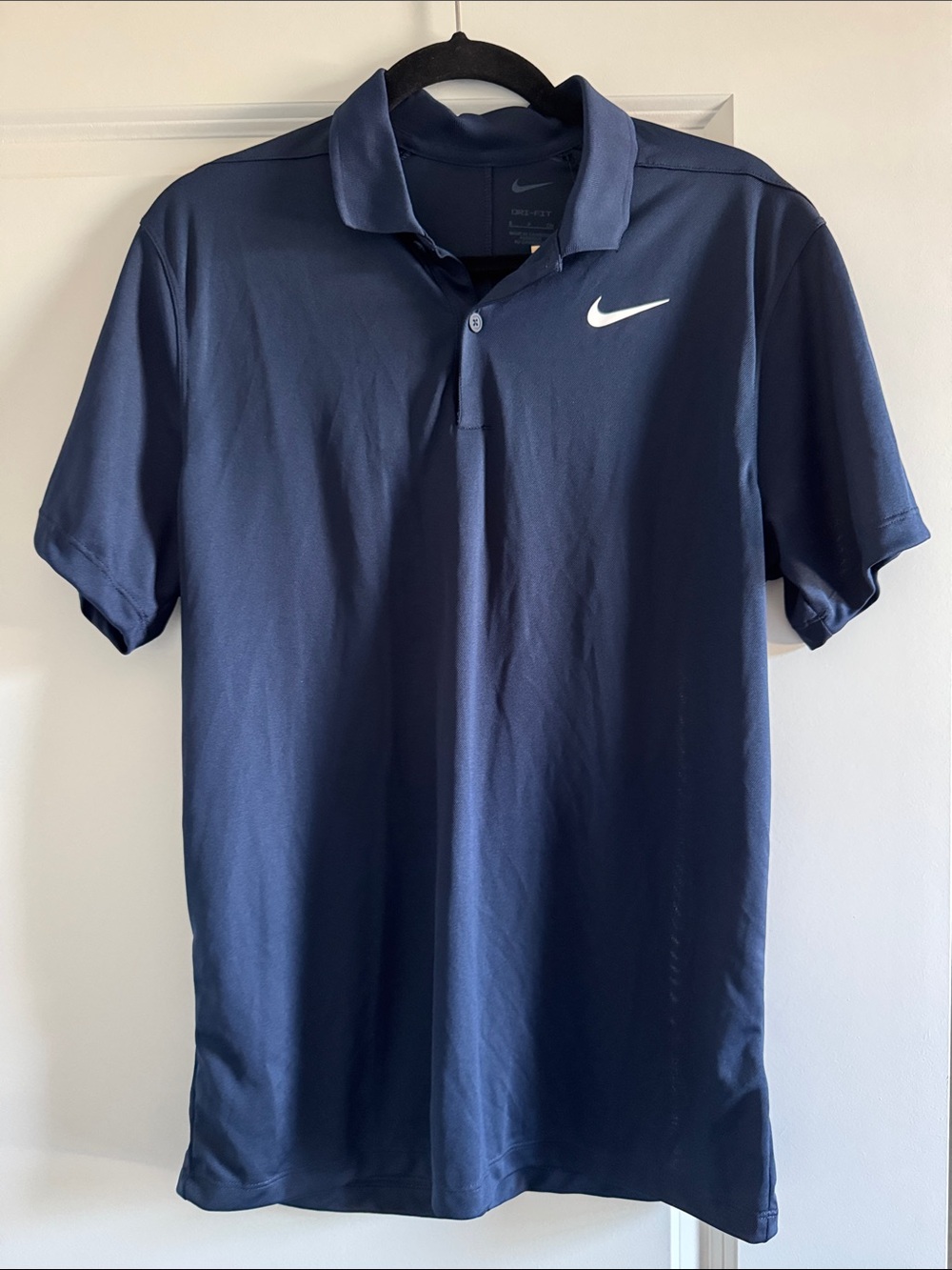 Nike Men’s Dark Navy Polo with White Swoosh